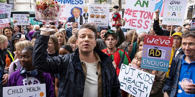 Celebrity chef Jamie Oliver stages a protest outside 10 Downing Street May 20, 2022, in London. The "Eton Mess" demonstration was aimed at highlighting the government's "U-Turn" on its anti-obesity strategy.