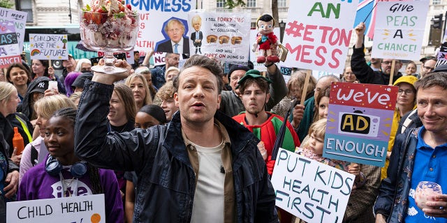 Celebrity chef Jamie Oliver stages a protest outside 10 Downing Street May 20, 2022, in London. The "Eton Mess" demonstration was aimed at highlighting the government's "U-Turn" on its anti-obesity strategy.