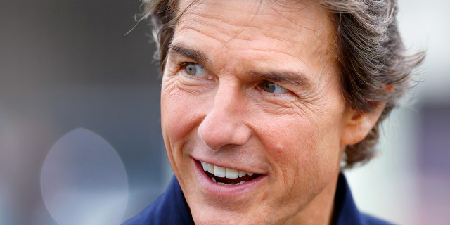 Tom Cruise arrives to host the "A Gallop Through History" performance, part of the official celebrations for Queen Elizabeth II's Platinum Jubilee at Windsor Castle on May 15, 2022.