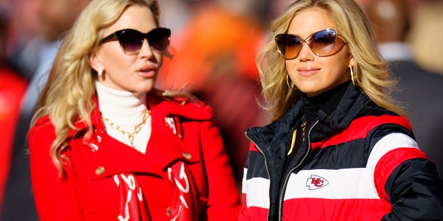 Gracie Hunt, right, the daughter of Kansas City Chiefs owner Clark Hunt, and Tavia Hunt enjoy the sidelines before a game against the Denver Broncos at Empower Field at Mile High on December 11, 2022 in Denver.