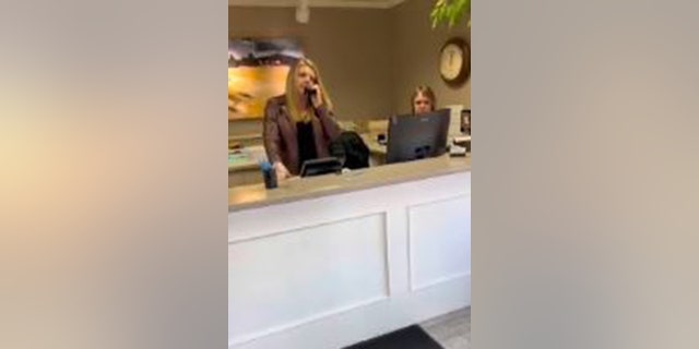 The moment Great Falls Inn general manager Kelli LaFountain calls police regarding "disruptive guests in the lobby."