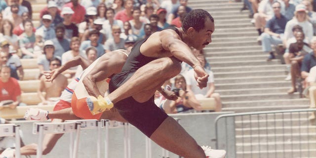 Greg Foster competes in an unidentified track event in the mid-1980s.