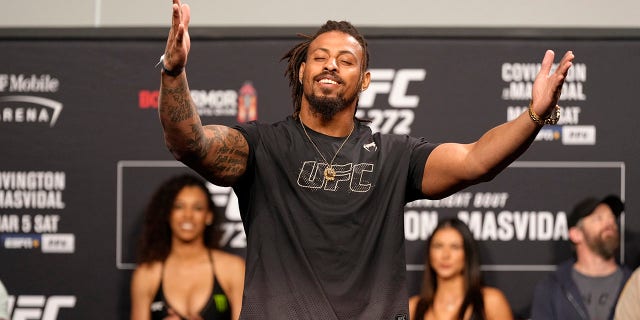 Greg Hardy poses on the scale during the UFC 272 ceremonial weigh-in at UFC T-Mobile Arena on March 04, 2022, in Las Vegas, Nevada.