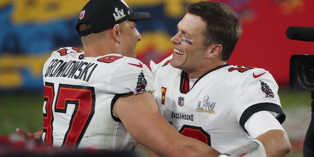 Buccaneers quarterback Tom Brady and tight end Rob Gronkowski celebrate after winning Super Bowl LV against the Kansas City Chiefs on Feb. 7, 2021, at Raymond James Stadium in Tampa, Florida.