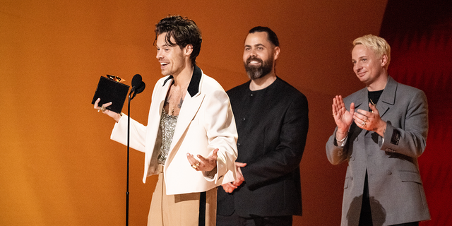  Harry Styles, Tyler Johnson and Kid Harpoon accept the Album Of The Year award for "Harry's House" during the 65th GRAMMY Awards at Crypto.com Arena on February 05, 2023 in Los Angeles, California. 