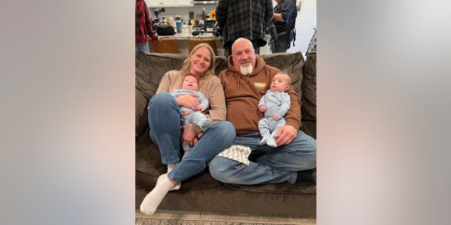 The two were pictured spending time with her daughter Mykelti's twin babies in the post Brown shared on Valentine's Day.