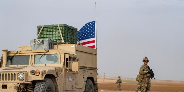 U.S. forces patrol near the Hori rehabilitation center for children of the suspected Islamic State (IS) group, in Tel Maaruf city, northeastern Hasakeh province, Dec. 15, 2022.