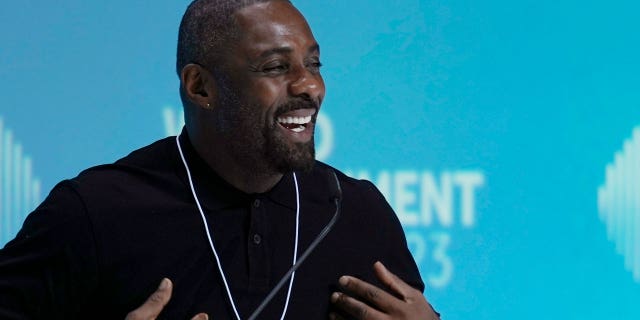 Idris Elba speaks during the World Government Summit in Dubai on Feb. 14. While on stage, Elba brought up the persistent discussions about him taking over as Ian Fleming's famed British spy 007.