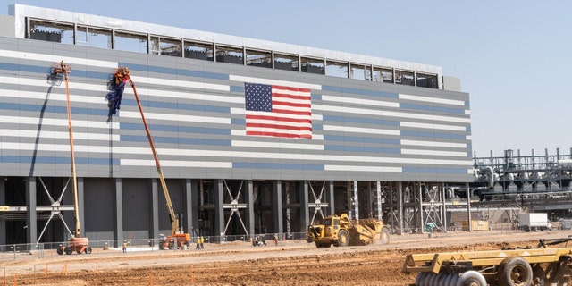 Construction equipment prepares the site for two new chip factories at Intel Corp.'s Ocotillo campus in Chandler, Arizona, in September 2021.