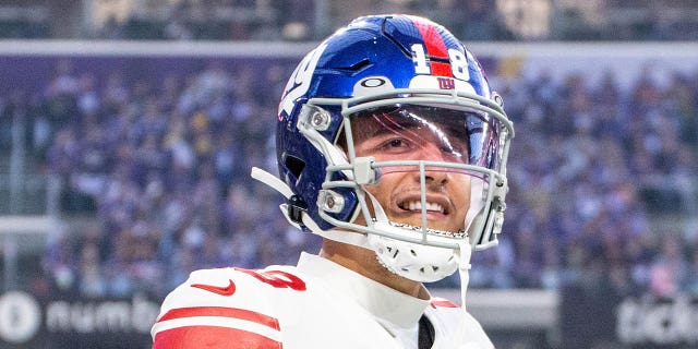 New York Giants wide receiver Isaiah Hodgins (18) looks on after a touchdown during the NFL game between the New York Giants and the Minnesota Vikings on January 15, 2023, at US Bank Stadium in Minneapolis, MN.