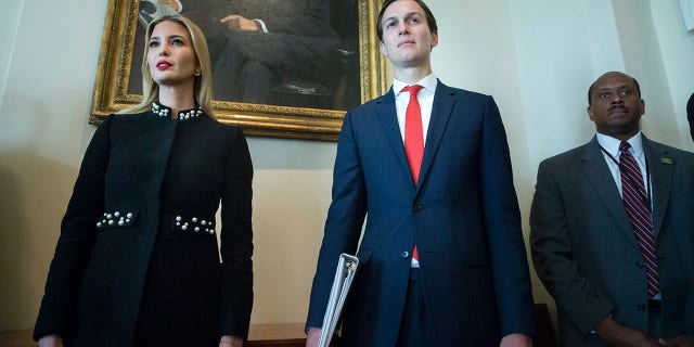 White House Senior Advisor Jared Kushner (R) and Ivanka Trump (L) attend a meeting held by US President Donald J. Trump with members of his Cabinet, in the Cabinet Room of the White House in Washington, DC.