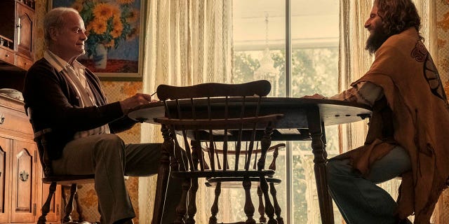 Kelsey Grammer as Chuck Smith and Jonathan Roumie as Lonnie Frisbee in Jesus Revolution.