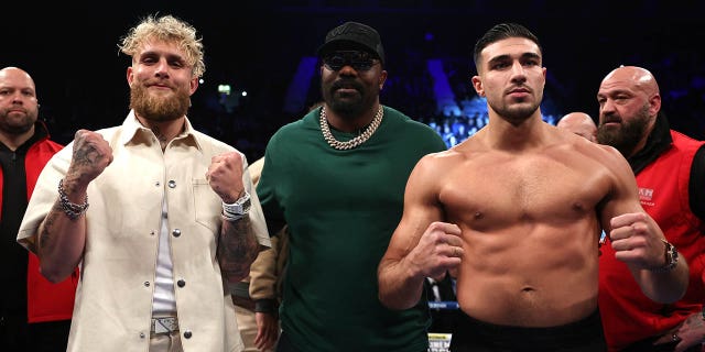 Jake Paul (L) and Tommy Fury (R) pose prior to the Artur Beterbiev vs Anthony Yarde fight night at OVO Arena Wembley on January 28, 2023 in London, England.