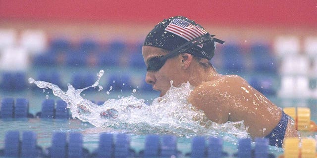 Jamie Cail of the United States performs during the Pan Pacific Swim Championships in Fukuoka City, Japan on August 11, 1997. 