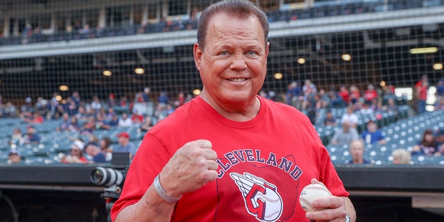 Wrestling legend and WWE announcer Jerry The King Lawler on the field before the Major League Baseball game between the Minnesota Twins and the Cleveland Guardians on September 16, 2022 at Progressive Field in Cleveland, OH.