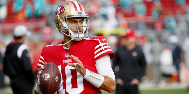 San Francisco 49ers quarterback Jimmy Garoppolo warms up before the game against the Miami Dolphins at Levi's Stadium in Santa Clara, California, on Dec. 4, 2022.