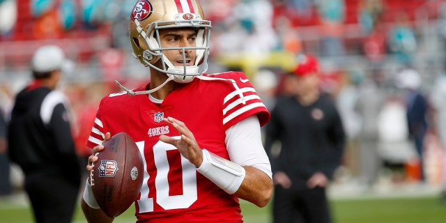 San Francisco 49ers quarterback Jimmy Garoppolo warms up before the game against the Miami Dolphins at Levi's Stadium in Santa Clara, California, on Dec. 4, 2022.