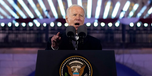 President Joe Biden delivers a speech marking the one-year anniversary of the Russian invasion of Ukraine, Tuesday, Feb. 21, 2023, at the Royal Castle Gardens in Warsaw.