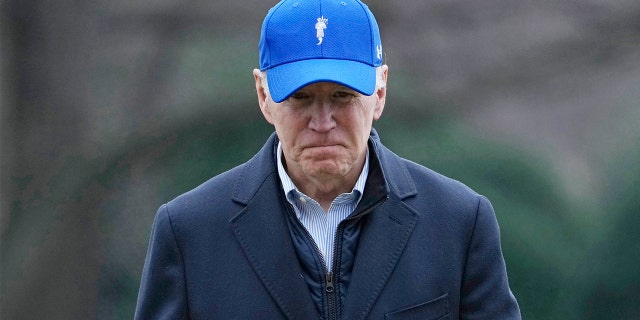 President Biden walks off Marine One on the South Lawn of the White House, Feb. 6, 2023.