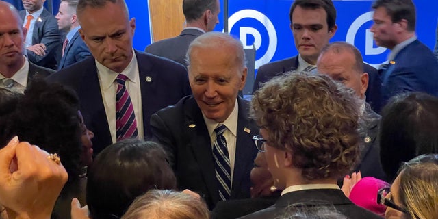President Biden shakes hands of supporters along the rope line, after addressing the crowd at the Democratic National Committee's winter meeting, in Philadelphia, Pennsylvania, on Feb. 3, 2023