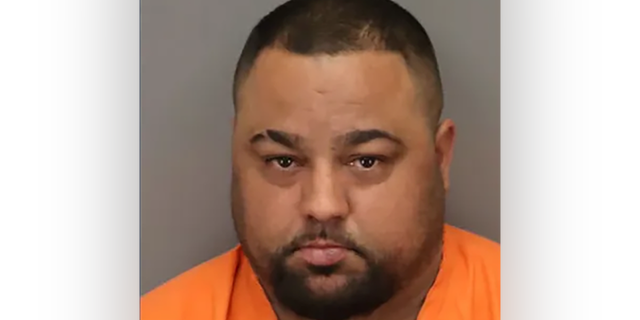 Johnny Julio Martin was charged with child neglect after he took his 13-year-old son to watch illegal street racing when a motorcycle crashed into his son and killed him.