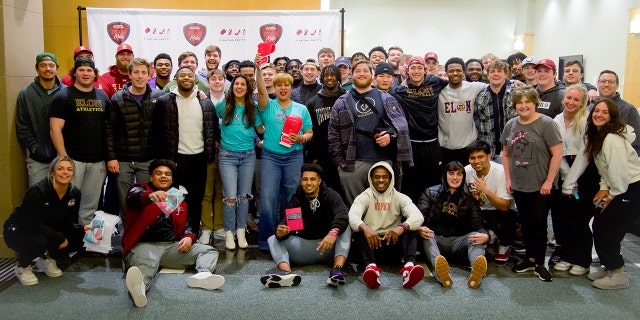 Volunteers got together at North Carolina's Elon University's football stadium to create care packages for women battling cancer on Feb. 2, 2023.