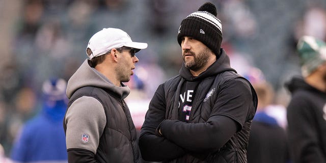 Philadelphia Eagles head coach Nick Sirianni (right) speaks with defensive coordinator Jonathan Gannon during pregame of the National Football League game between the New York Giants and the Philadelphia Eagles on January 8, 2023 at the Lincoln Financial Field in Philadelphia, PA
