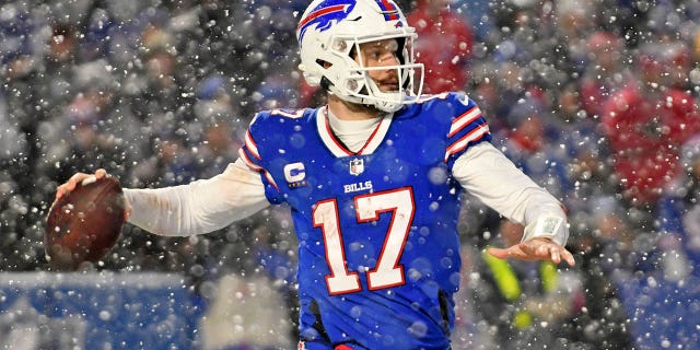 Buffalo Bills quarterback Josh Allen passes against the Cincinnati Bengals during the AFC divisional round game at Highmark Stadium on January 22, 2023, in Orchard Park, New York.