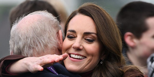 Kate Middleton hugs her former school teacher in Cornwall. 