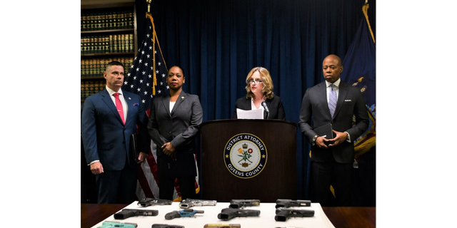 Queens District Attorney Melinda Katz, center, announced a 28-count indictment of 23 alleged members of the Crips gang.