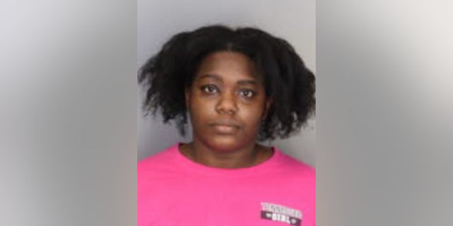 Kaydra Johnson, 28, faces charges of reckless conduct for allegedly shooting at her husband while her children where in their home.