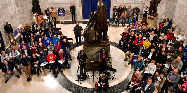 Members of the Faith and Family advocacy group, a pro life organization, hold a rally in the rotunda of the Kentucky State Capitol in Frankfort, Ky., Thursday, Feb. 16, 2023.