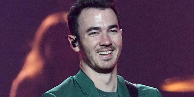 Recording artist Kevin Jonas of the Jonas Brothers performs during a stop on the group's Happiness Begins Tour at the MGM Grand Garden Arena on October 18, 2019 in Las Vegas.