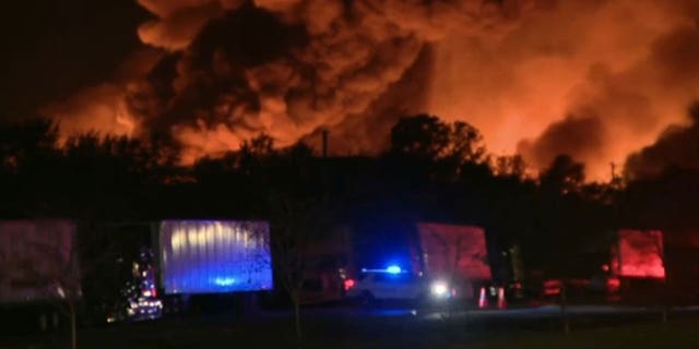 A fire is ablaze and has spread over five acres behind a nursery supply plant in Kissimmee, Fl. The fire started with two planters and the spread, officials said. 