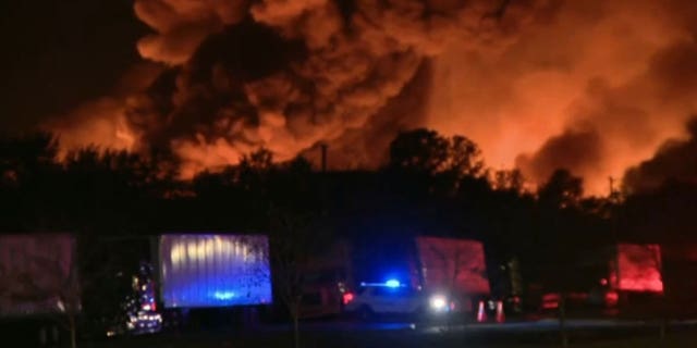 A fire is ablaze and has spread over five acres behind a nursery supply plant in Kissimmee, Fl. The fire started with two planters and the spread, officials said. 