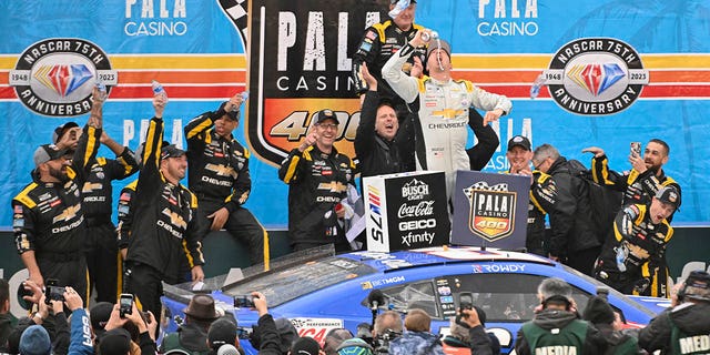 Kyle Busch, driver of the #8 Lucas Oil Chevrolet, celebrates in victory lane after winning the NASCAR Cup Series Pala Casino 400 at Auto Club Speedway on February 26, 2023 in Fontana, California.