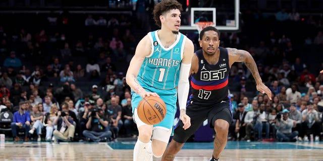 LaMelo Ball #1 of the Charlotte Hornets dribbles the ball against the Detroit Pistons on February 27, 2023, at Spectrum Center in Charlotte, North Carolina.