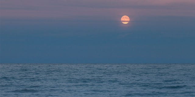 Late evening Moon over Lake Huron, Lake Huron, Michigan. 