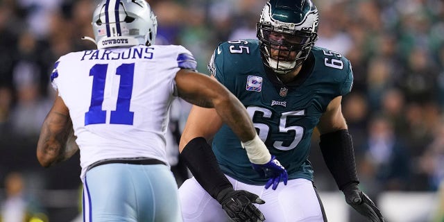 Lane Johnson #65 of the Philadelphia Eagles blocks Micah Parsons #11 of the Dallas Cowboys at Lincoln Financial Field on October 16, 2022 in Philadelphia, Pennsylvania.