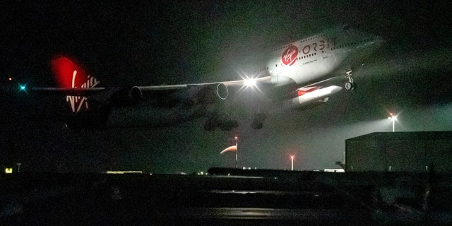 A modified Virgin Atlantic Boeing 747, named Cosmic Girl, takes off from Space Cornwall at Newquay Cornwall Airport on January 9, 2023, aboard Virgin Orbit's LauncherOne rocket. 