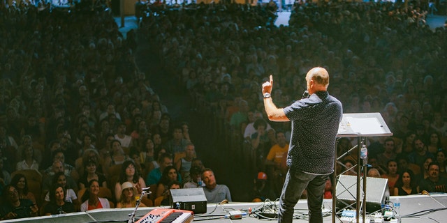 Pastor Greg Laurie of Harvest Christian Fellowship in Riverside, California speaks to 2016 Bridgefest crowd.