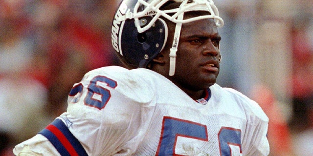 New York Giants linebacker Lawrence Taylor walks off the field after losing to the San Francisco 49ers, 44-3, in their NFC playoff game at Candlestick Park on January 15, 1998.
