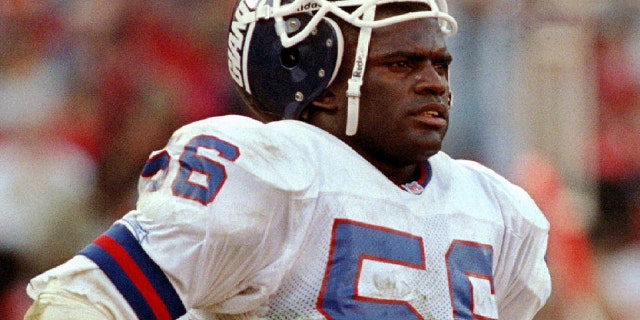 New York Giants linebacker Lawrence Taylor walks off the field after losing to the San Francisco 49ers, 44-3, in their NFC playoff game at Candlestick Park on January 15, 1998.