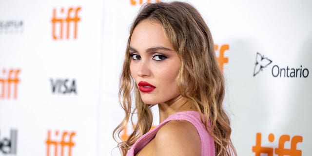 Lily-Rose Depp opened up about her childhood and dealing with imposter syndrome as she films "The Idol."
