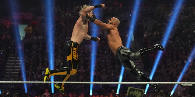 Logan Paul (left) and Ricochet battle during the men’s WWE Royal Rumble at the Alamodome in San Antonio Jan. 28, 2023.