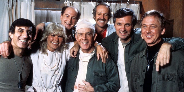 "M*A*S*H" sitcom actors, from left, Jamie Farr, Loretta Swit, David Ogden Stiers, Harry Morgan, Mike Farrell, Alan Alda and William Christopher in a publicity portrait, circa 1978.