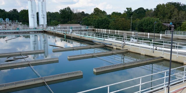 Clouds are reflected off the City of Jackson's O.B. Curtis Water Treatment Facility's sedimentation basins in Ridgeland, Mississippi, on Sept. 2, 2022.