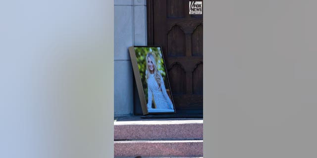 A portrait of Madison Brooks sits outside the church for her funeral in Covington, LA, Friday, February 3, 2023. Brooks, a 19-year-old sophomore at LSU, was allegedly raped before she was fatally struck by a car in the early morning hours of Jan. 15.