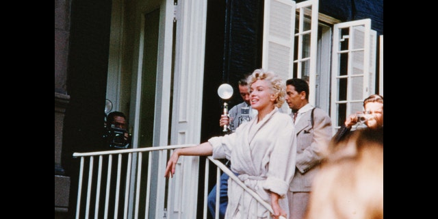 A still of Marilyn Monroe smiling while filming The Seven Year Itch in New York City