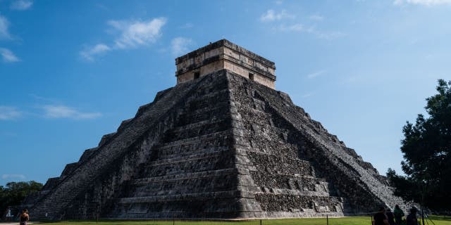 Tourists visit Temple of Kukulcan in Chichen Itza archeological site, in Yucatan, Mexico on Dec. 8, 2022. 